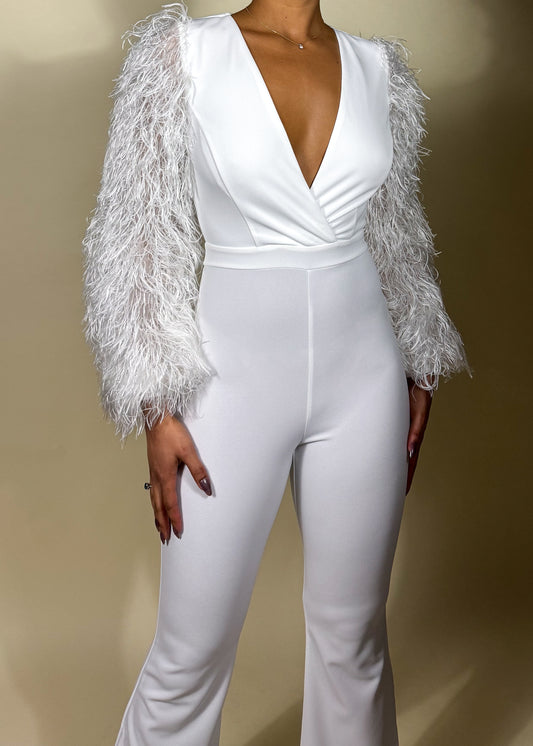 Elegant evening jumpsuit
Cocktail party outfit
Red carpet look
Date night fashion
Holiday party attire
Glamorous event outfit
Black-tie jumpsuit
Formal dinner look
Luxury fashion statement
Stylish night-out outfit
Black feather sleeve jumpsuit
Plunging V-neck jumpsuit
Statement sleeve fashion
Wide-leg fitted jumpsuit
Monochrome elegant outfit
Tailored women’s jumpsuit
Dramatic sleeve fashion
Sleek all-black ensemble
Trendy one-piece outfit
High-fashion jumpsuit
Bold and sophisticated
Modern luxury aesthetic