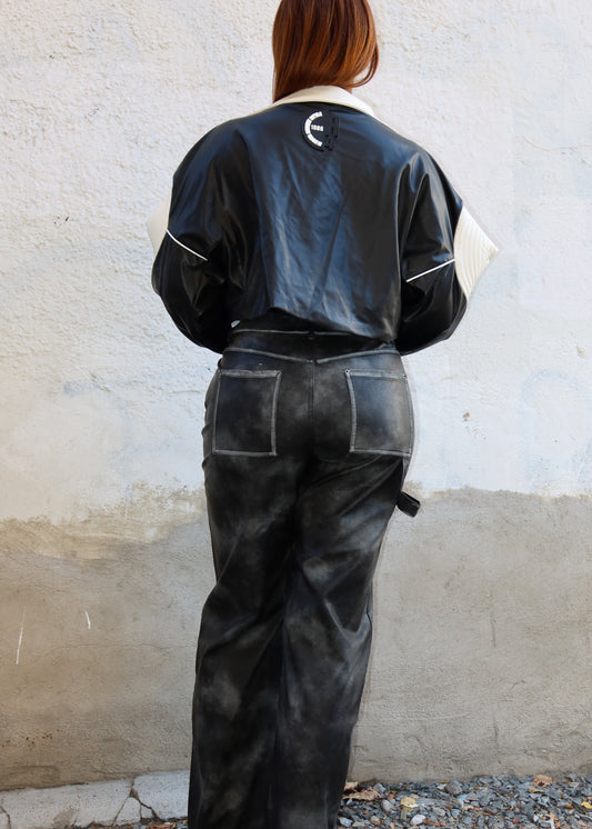 Edgy streetwear fashion
Night-out statement outfit
High-fashion runway look
Trendy clubwear pants
Alternative festival outfit
Bold everyday wear
Washed-effect leather pants
Vintage-inspired leather trousers
High-waisted flared pants
Grunge aesthetic leather bottoms
Textured coated pants
Contrast-stitch detail trousers
Retro-futuristic fashion
Urban punk aesthetic
Industrial street style
Dark grunge outfit
Avant-garde statement piece
Sleek yet edgy fashion trend