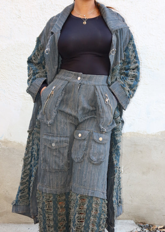 Edgy streetwear outfit
Urban casual fashion
Alternative festival wear
Grunge-inspired look
Statement street style
High-fashion casual outfit
Bold everyday wear
Distressed cargo pants
Shredded wide-leg pants
Patchwork utility trousers
Zipper pocket cargo jeans
Textured ripped denim pants
Military-inspired fashion
Avant-garde streetwear
Futuristic punk aesthetic
Industrial fashion trend
Rugged yet chic ensemble
Edgy utilitarian vibe
Vintage meets modern grunge