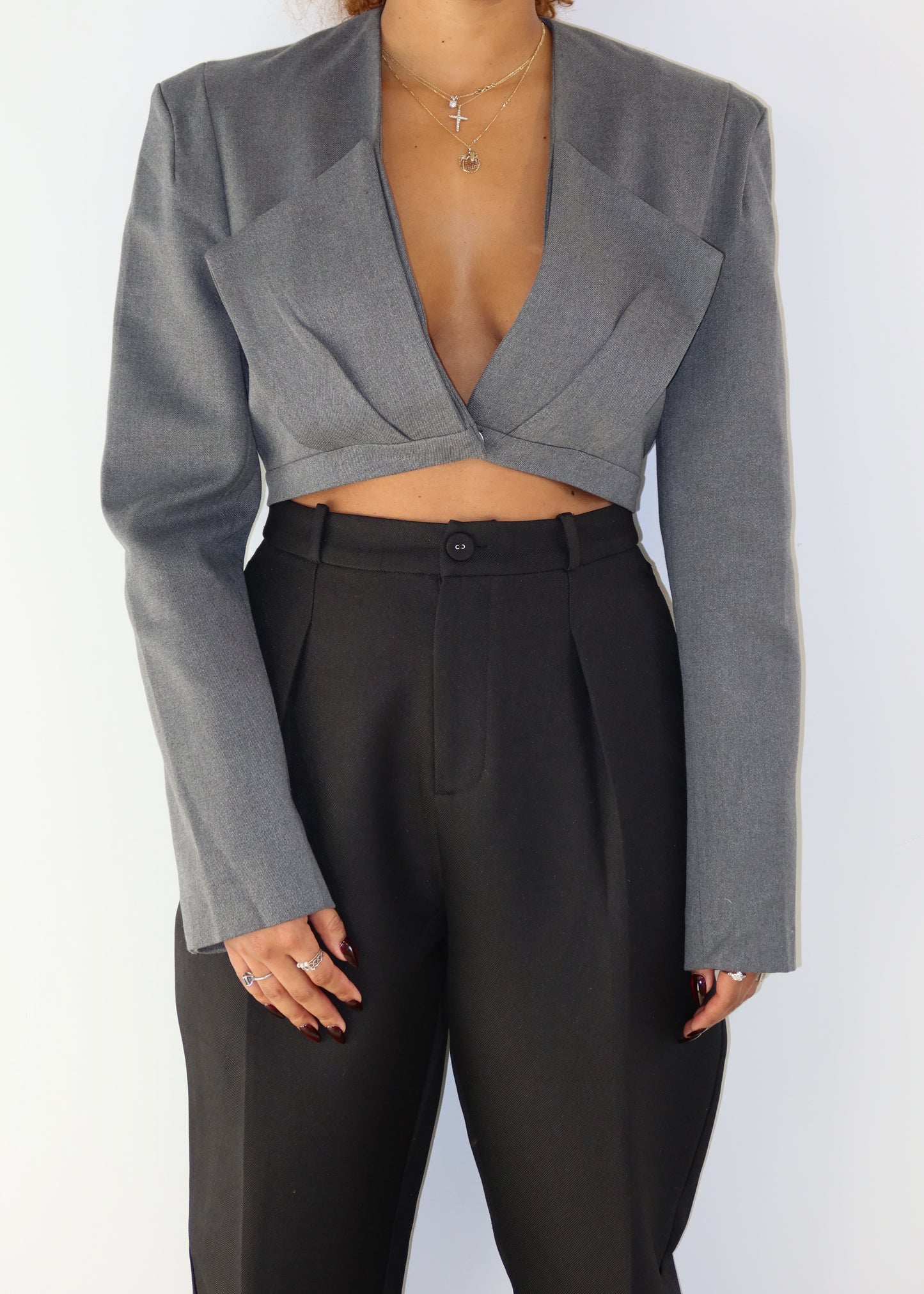 Party blazer
Chic casual outfit for women
Sleek and stylish power suit
Elegant evening dinner look
Red carpet-inspired structured blazer
Architectural cropped blazer with strong shoulders
High-waisted tailored trousers for a polished look
Contemporary asymmetrical suit jacket
Sleek deep-plunge blazer with modern cuts
Sculptural outerwear meets minimalistic tailoring
Modern cropped gray blazer
Sharp structured tailored blazer
Bold power dressing for women
Minimalist avant-garde suit style
Edgy