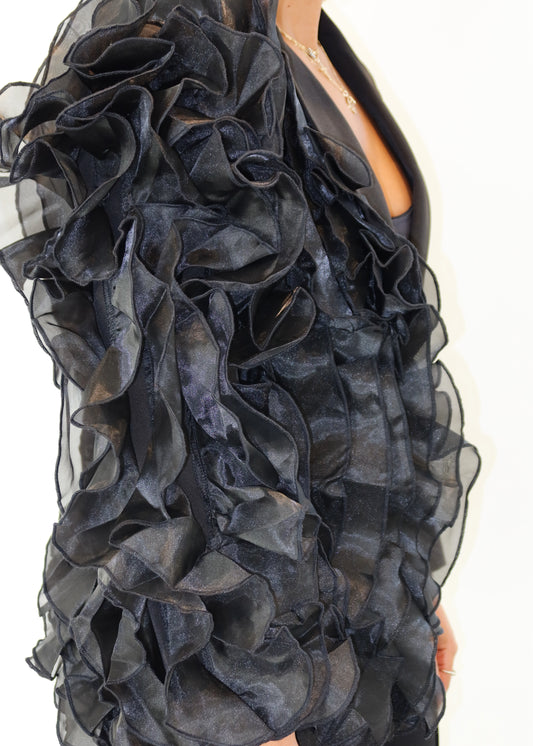 Dramatic eveningwear blazer
Statement outerwear for fashion events
Sophisticated yet daring business look
Red carpet-worthy fashion blazer
Perfect blazer
One-shoulder ruffle blazer
Luxe organza sleeve detailing
Sculptural blazer with dramatic flair
Artistic couture-inspired blazer
Elevated tailoring with a twist
Black structured blazer with ruffle detail
Avant-garde asymmetrical blazer
High-fashion statement sleeve blazer
Edgy power suit with organza sleeve
Unique runway-inspired tailored jacket