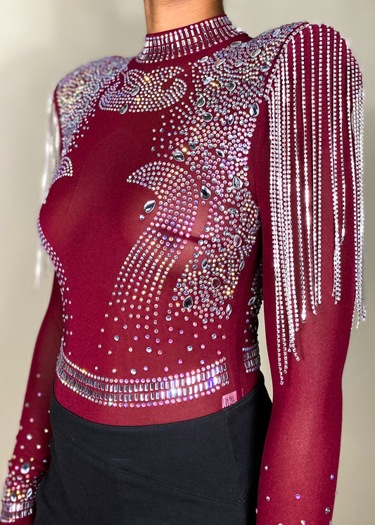 Party outfit
Nightclub fashion
Concert outfit
Festival look
Evening wear
Special occasion attire
Rhinestone-embellished bodysuit
Sheer long sleeve top
High-neck mesh bodysuit
Beaded shoulder details
Statement fringe design
Form-fitting mini skirt
Embellished sheer top
Bold and edgy look
High-fashion aesthetic
Daring and sexy outfit
Statement eveningwear
Eye-catching details
Trendy and bold ensemble