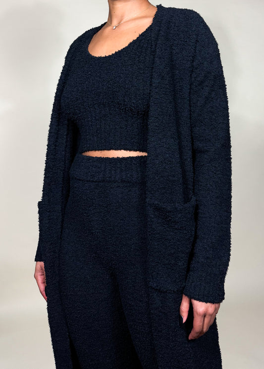 Loungewear, Casual wear, Cozy home outfit, Travel outfit, Work-from-home attire, Relaxed weekend style, Chilly weather layering, Three-piece knit set, Soft and fuzzy texture, Cropped tank top, High-waisted wide-leg pants, Long duster cardigan with pockets, Relaxed and cozy fit, soft fuzzy knitwear, Relaxed fit lounge pants, Minimalist winter outfit, Comfortable homewear set, Travel-friendly lounge set, Warm and stylish cardigan set, Chic casual knit outfit, Fashionable stay-at-home wear, Effortless comfy