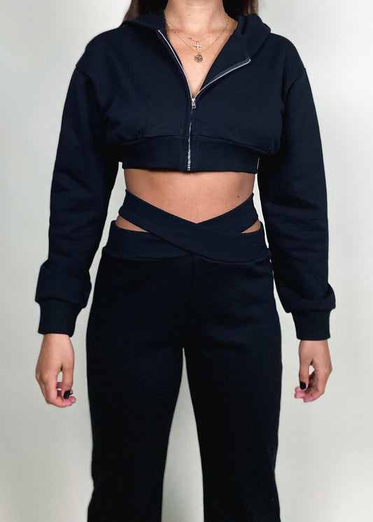 Casual loungewear
Athleisure outfit
Travel outfit
Weekend wear
Streetwear fashion
Cozy fall outfit
Everyday essentials
Cut-out waistband joggers
Cropped zip-up hoodie
High-waisted sweatpants
Two-piece lounge set
Elastic waist joggers
Hoodie with zipper
Soft fleece fabric
Sporty chic
Minimalist aesthetic
Relaxed fit
Trendy athleisure
Comfy yet stylish
Urban street style
Monochrome outfit