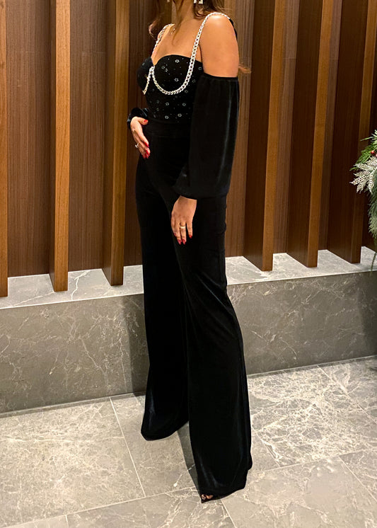 Elegant evening jumpsuit
Luxury cocktail outfit
Glamorous partywear
Date night fashion
Red carpet jumpsuit
Wedding guest outfit
Holiday party fashion
Birthday celebration look
Formal dinner attire
Clubbing and nightlife outfit
Embellished black jumpsuit
Off-shoulder sleeve jumpsuit
Beaded bustier jumpsuit
Chain strap jumpsuit
Statement eveningwear
Wide-leg jumpsuit
Fitted waist jumpsuit
Crystal-studded bodice
Luxe velvet jumpsuit
Designer-inspired outfit
Sophisticated and chic
Sexy yet classy outfit