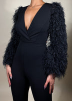 Elegant evening jumpsuit
Cocktail party outfit
Red carpet look
Date night fashion
Holiday party attire
Glamorous event outfit
Black-tie jumpsuit
Formal dinner look
Luxury fashion statement
Stylish night-out outfit
Black feather sleeve jumpsuit
Plunging V-neck jumpsuit
Statement sleeve fashion
Wide-leg fitted jumpsuit
Monochrome elegant outfit
Tailored women’s jumpsuit
Dramatic sleeve fashion
Sleek all-black ensemble
Trendy one-piece outfit
High-fashion jumpsuit
Bold and sophisticated
Modern luxury aesthetic