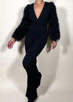 Elegant evening jumpsuit
Cocktail party outfit
Red carpet look
Date night fashion
Holiday party attire
Glamorous event outfit
Black-tie jumpsuit
Formal dinner look
Luxury fashion statement
Stylish night-out outfit
Black feather sleeve jumpsuit
Plunging V-neck jumpsuit
Statement sleeve fashion
Wide-leg fitted jumpsuit
Monochrome elegant outfit
Tailored women’s jumpsuit
Dramatic sleeve fashion
Sleek all-black ensemble
Trendy one-piece outfit
High-fashion jumpsuit
Bold and sophisticated
Modern luxury aesthetic