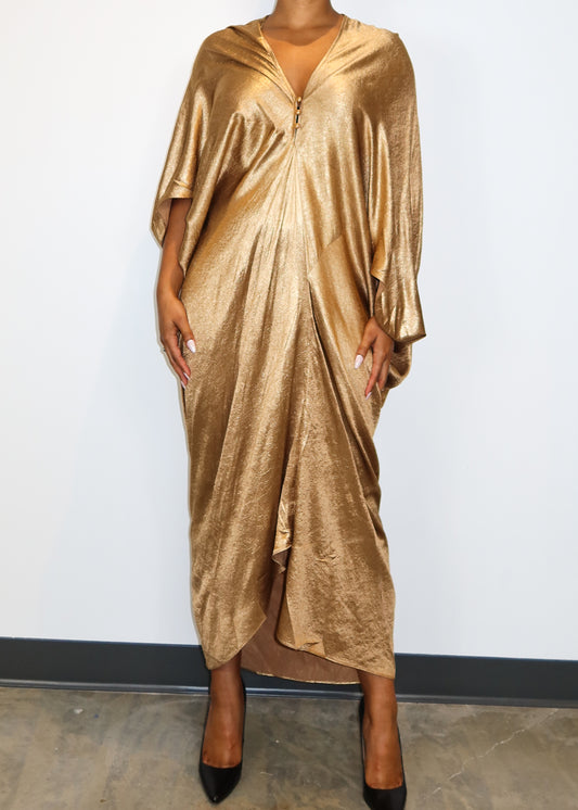 Red carpet event dress
Wedding guest formal gown
Luxury evening outfit
Holiday party kaftan
Gala night metallic dress Fall and winter holiday dress
Summer elegant evening dress
Spring statement kaftan
Timeless luxury fashion
Draped silhouette gown
Satin gold maxi dress
Loose-fit kaftan with zipper
Modern modest fashion dress
Elegant metallic shimmer gown
Gold metallic kaftan dress
Elegant draped maxi dress
Luxe oversized gown
Flowing batwing sleeve dress
Statement evening wear