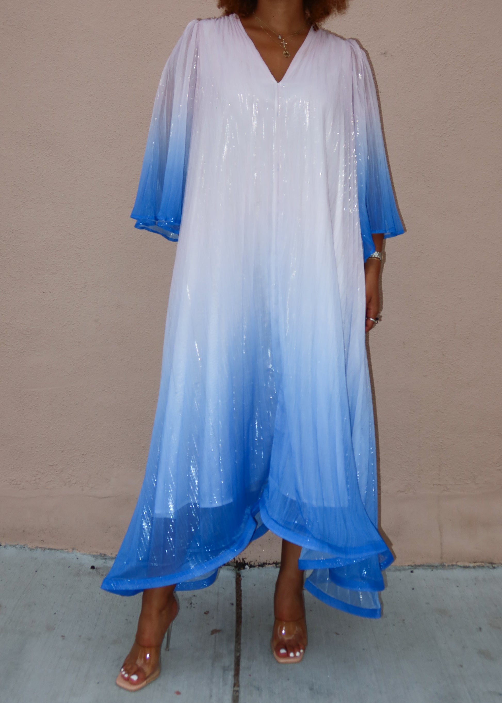 Beach vacation outfit
Summer wedding guest dress
Resort evening gown
Casual yet elegant event dress
Holiday party flowy dress Summer beach party dress
Spring wedding guest dress
Fall evening gown
resort getaway outfit
Loose-fit gradient kaftan
Flowy bell sleeve dress
Lightweight chiffon maxi dress
Relaxed V-neck pleated dress
Breezy bohemian maxi gown
Ombre maxi dress
Flowing boho kaftan
Elegant gradient dress
Blue and white pleated gown
Chic resort wear fashion