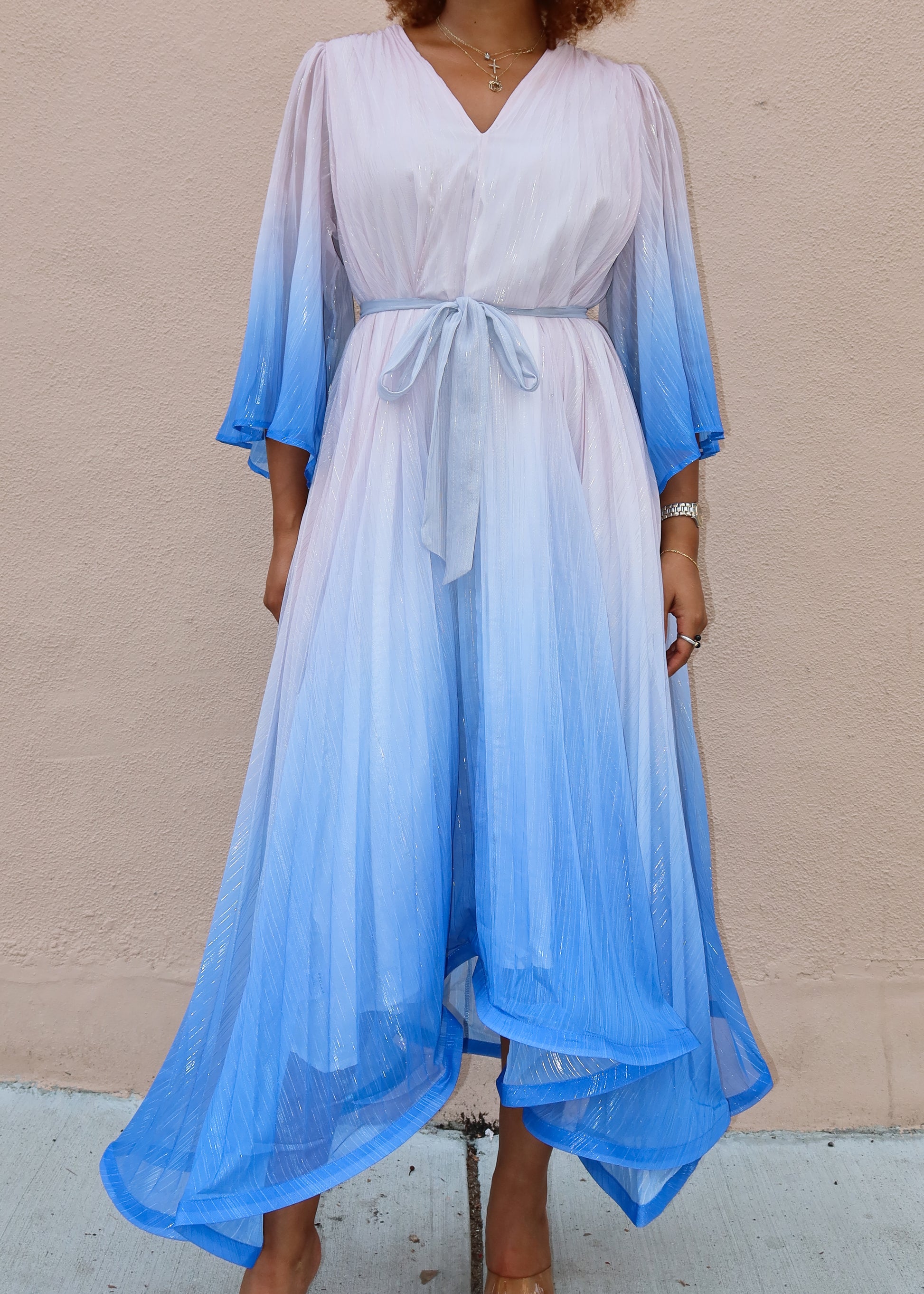 Beach vacation outfit
Summer wedding guest dress
Resort evening gown
Casual yet elegant event dress
Holiday party flowy dress Summer beach party dress
Spring wedding guest dress
Fall evening gown
resort getaway outfit
Loose-fit gradient kaftan
Flowy bell sleeve dress
Lightweight chiffon maxi dress
Relaxed V-neck pleated dress
Breezy bohemian maxi gown
Ombre maxi dress
Flowing boho kaftan
Elegant gradient dress
Blue and white pleated gown
Chic resort wear fashion