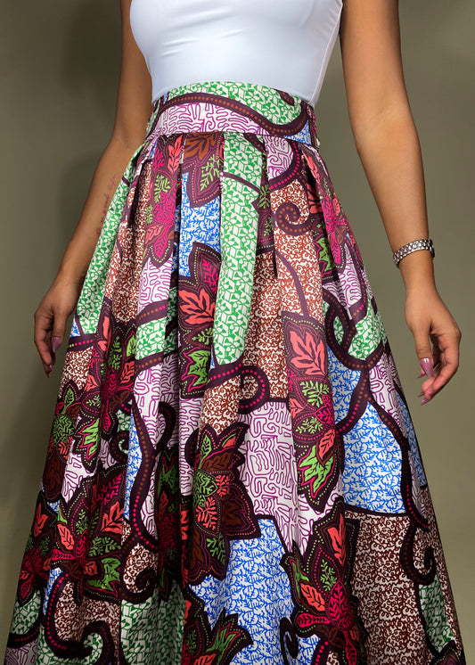 elegant summer outfit
Cultural celebration attire
Vibrant festival fashion
Wedding guest outfit idea
Chic vacation look
Brunch date outfit
Statement evening wear
Formal yet stylish ensemble
Bohemian-inspired fashion
event outfit
Ankara print fashion
High-waisted flared skirt
Colorful wax print fabric
Ethnic-inspired apparel
Flowing silhouette design
Bold floral print skirt
Boho-glam statement look
Contemporary ethnic wear
Elegant yet bold outfit
Artistic and unique fashion
Effortlessly sophisticated
Classy 