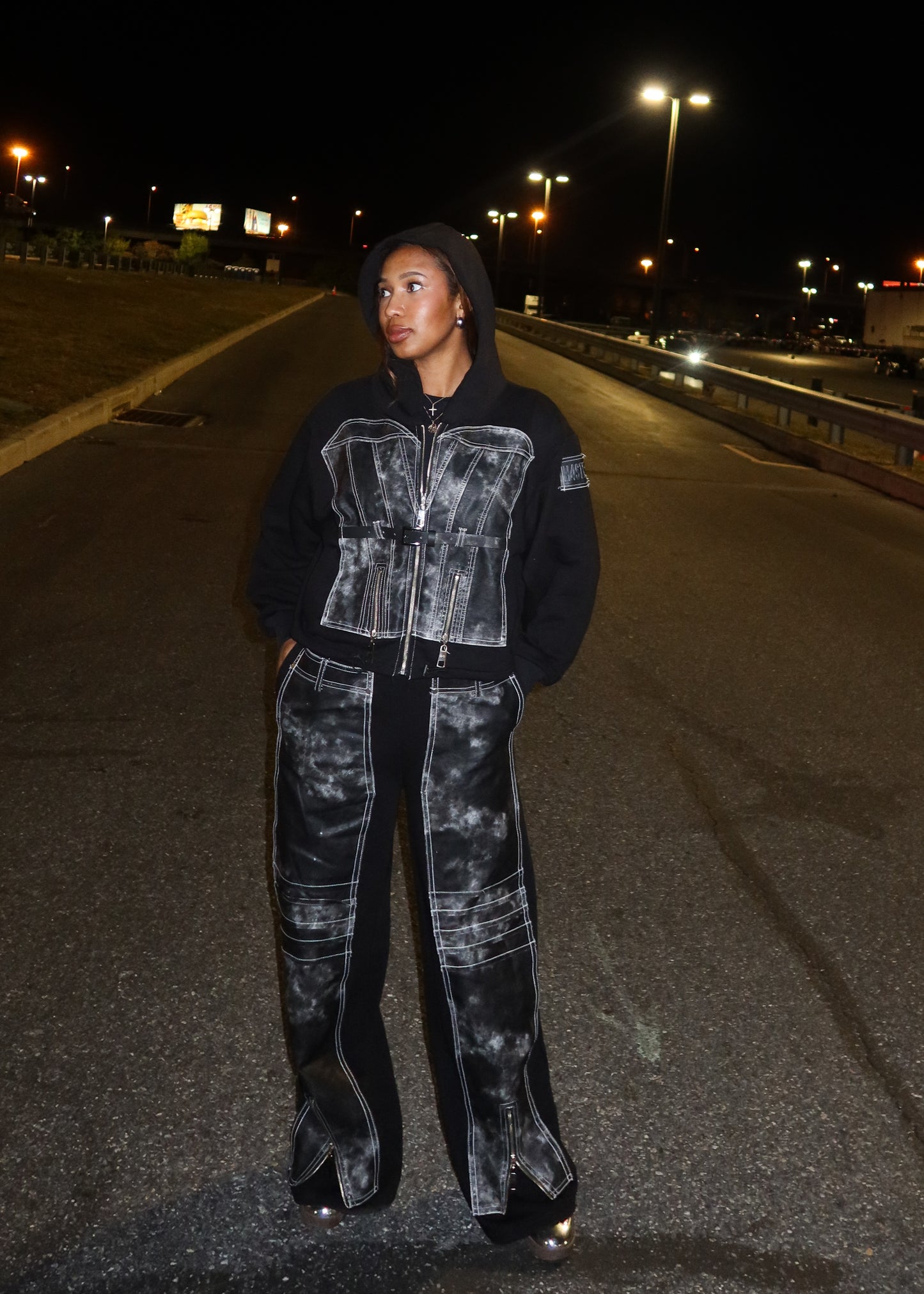 Streetwear statement hoodie
Concert or festival outfit
Edgy urban fashion
Casual-chic evening wear
Weekend street-style look
Fashion-forward nightlife outfit
Edgy street fashion
Retro-futuristic grunge
Statement urban wear
Bold high-fashion denim
Vintage-inspired meets modern
Distressed and deconstructed style
