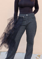 Statement evening pants
High-fashion runway trousers
Edgy streetwear bottoms
Party-ready unique pants
Avant-garde event outfit
Fashion-forward cocktail attire
Wide-leg herringbone pattern pants
Tulle-embellished statement trousers
Asymmetrical layered pants
High-waisted structured pants
Zipper-detailed fashion trousers
Textured fabric statement bottoms
Dramatic avant-garde fashion
High-fashion editorial look
Experimental edgy couture
Bold asymmetrical style
Fashion-forward artistic design
Unique layered 