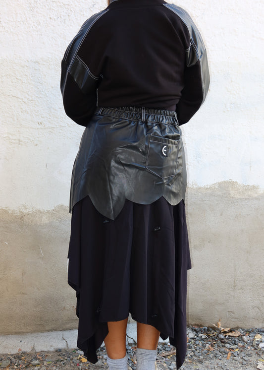 edgy fashion statement
Alternative fashion outfit
Casual chic outfit
Runway-inspired look
Fashion-forward event
Creative festival outfit
High-fashion street style
Urban wear trend
Asymmetrical leather skirt
Layered utility skirt
High-waisted leather and fabric mix
Mixed-material skirt
Cargo-inspired skirt
Utility pockets leather skirt
Deconstructed fashion skirt
Statement skirt with layers
Hybrid leather and fabric design
Avant-garde fashion
Edgy streetwear
Urban grunge style