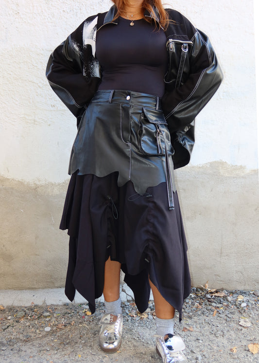 Streetwear fashion
Edgy fashion statement
Alternative fashion outfit
Casual chic outfit
Runway-inspired look
Fashion-forward event
Creative festival outfit
High-fashion street style
Urban wear trend
Asymmetrical leather skirt
Layered utility skirt
High-waisted leather and fabric mix
Mixed-material skirt
Cargo-inspired skirt
Utility pockets leather skirt
Deconstructed fashion skirt
Statement skirt with layers
Hybrid leather and fabric design
Avant-garde fashion
Edgy streetwear
Urban grunge style