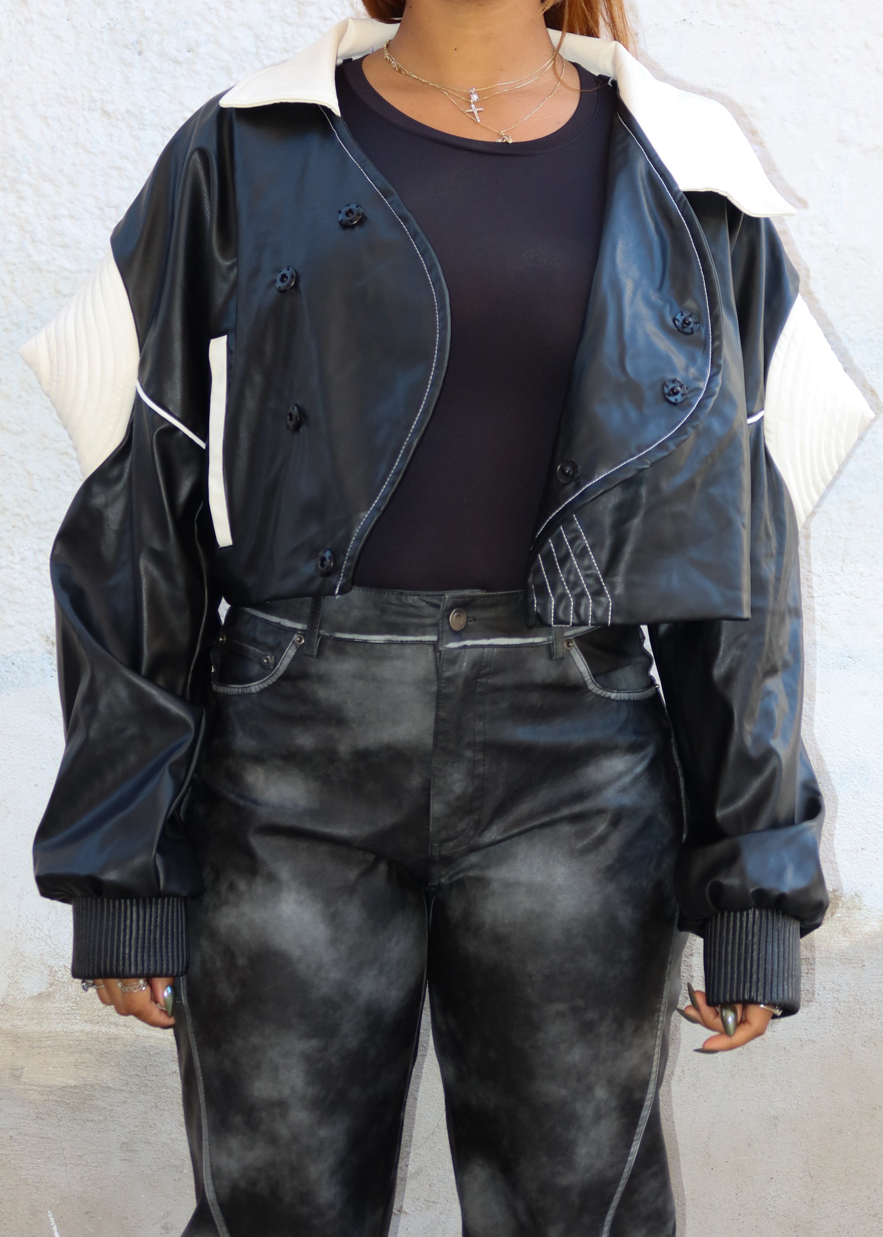 Streetwear, Casual wear, Urban fashion, Night out, Statement outfit, Fashion-forward looks, Faux leather jacket, Contrast panel design, Quilted shoulder details, Asymmetrical stitching, Oversized fit, Zip-up closure, Structured,  Leather bomber jacket, Oversized leather jacket, Statement outerwear, Designer-inspired jacket, High-fashion streetwear, Trendy fall jacket, Urban style jacket, Sporty luxe outerwear, Futuristic fashion, Black and white leather jacket, Athleisure-inspired jacket, Modern edgy 