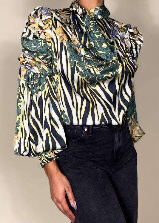 Workwear blouse
Business casual top
Evening dinner outfit
Special occasion blouse
Elegant office wear
Formal event fashion
Statement blouse for parties
High-neck puff sleeve blouse
Abstract print top
Ruffle detail blouse
Baroque-inspired fashion
Vintage chic blouse
Flowing long sleeve top
Dramatic statement blouse
Bold and sophisticated
Artistic and trendy
Vintage elegance
Modern bohemian fashion
Luxe and stylish
Feminine yet powerful
High-fashion blouse