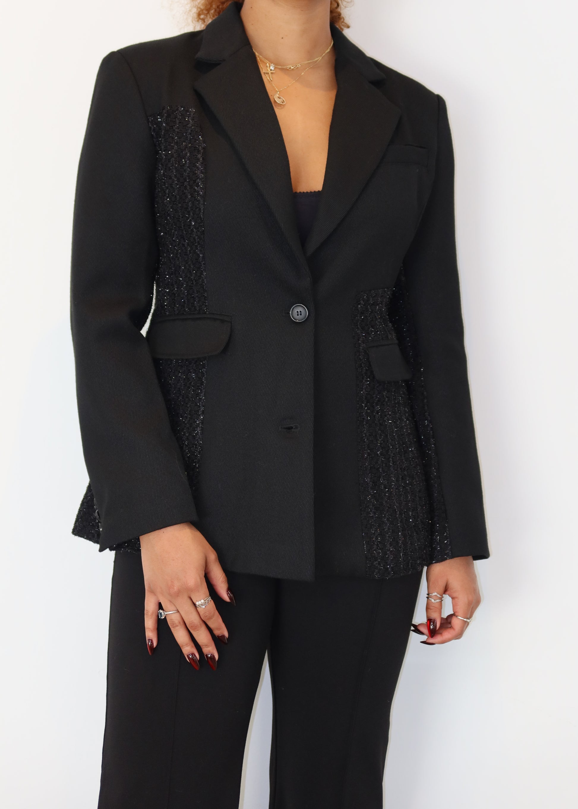 Professional office blazer
Workwear must-have blazer
Smart casual business outfit
Versatile evening blazer
Timeless black suit jacket
Textured panel blazer
Feminine structured blazer
Two-button classic blazer
Statement tailored outerwear
High-fashion black blazer
Classic black blazer for women
Elegant tailored blazer
Power dressing blazer
Business chic formal wear
Structured blazer for work