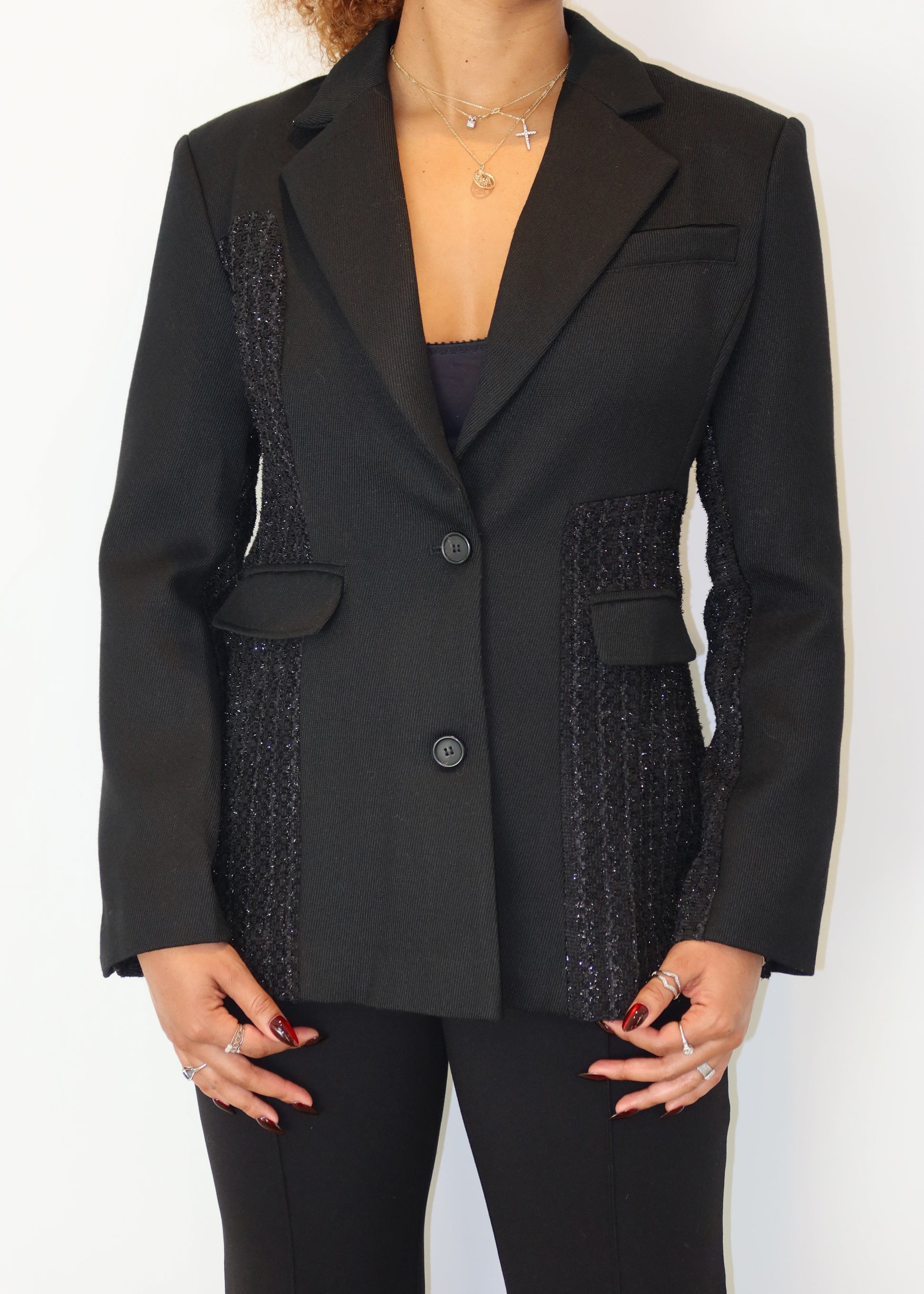 Professional office blazer
Workwear must-have blazer
Smart casual business outfit
Versatile evening blazer
Timeless black suit jacket
Textured panel blazer
Feminine structured blazer
Two-button classic blazer
Statement tailored outerwear
High-fashion black blazer
Classic black blazer for women
Elegant tailored blazer
Power dressing blazer
Business chic formal wear
Structured blazer for work