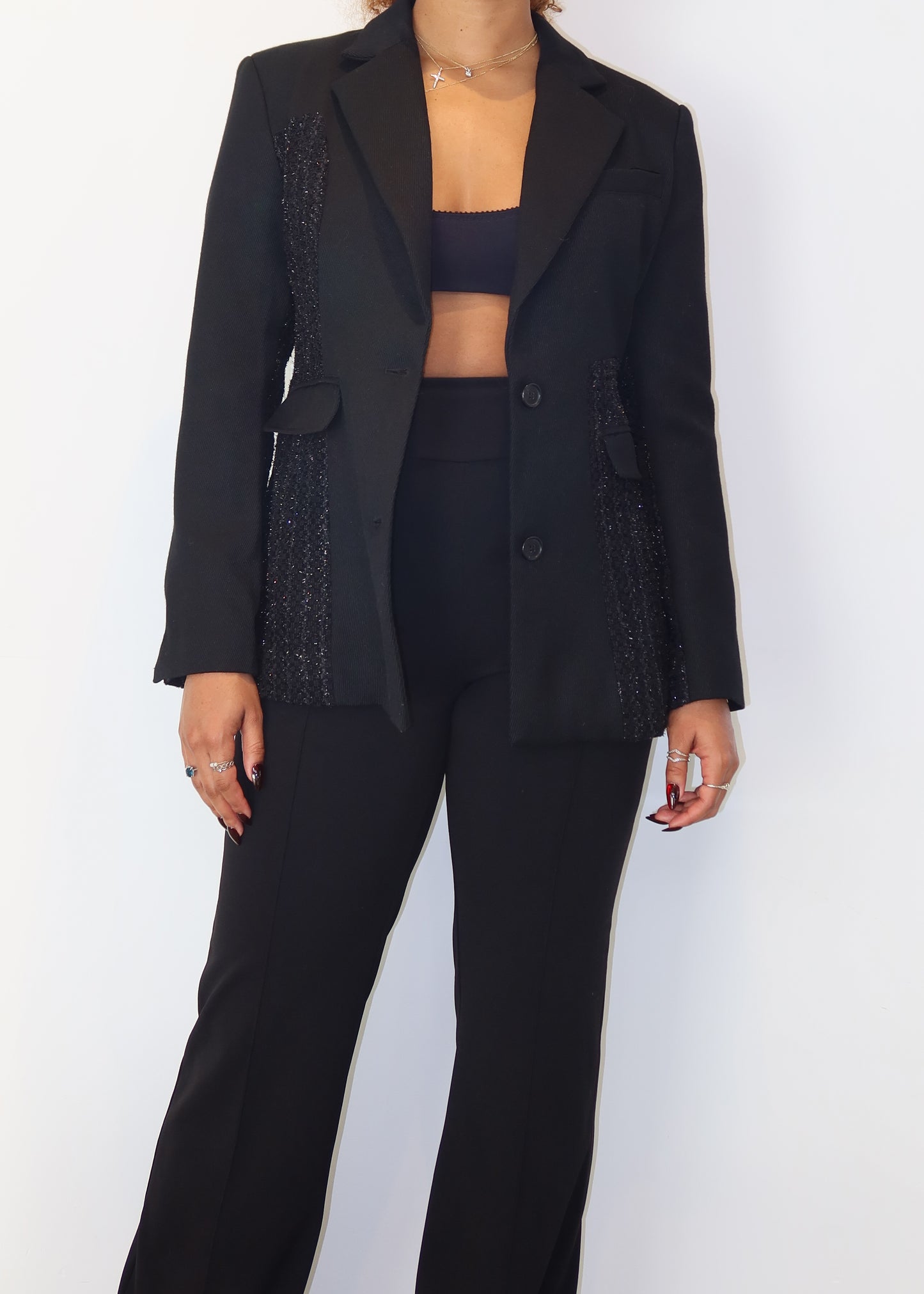 Professional office blazer
Workwear must-have blazer
Smart casual business outfit
Versatile evening blazer
Timeless black suit jacket
Textured panel blazer
Feminine structured blazer
Two-button classic blazer
Statement tailored outerwear
High-fashion black blazer
Classic black blazer for women
Elegant tailored blazer
Power dressing blazer
Business chic formal wear
Structured blazer for work