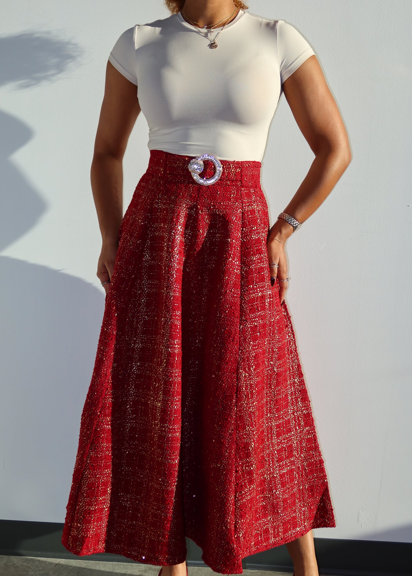 Elegant evening wear
Holiday party outfit
Festive Christmas fashion
Winter formal skirt
Wedding guest attire
Business casual chic
Sophisticated brunch look
Classy cocktail outfit
Timeless statement piece
event outfit
Red tweed midi skirt
High-waisted A-line skirt
Textured woven fabric
Belted tweed skirt
Vintage-inspired fashion
Metallic thread tweed skirt
Mid-length flared skirt
Structured pleated skirt
Classic Parisian chic
Luxury designer skirt