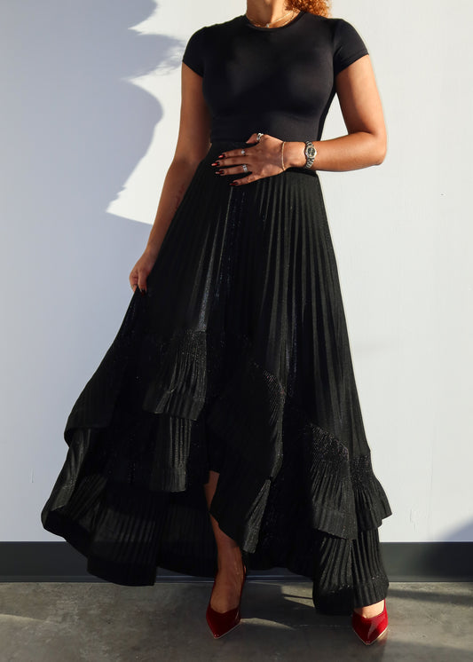 Evening wear skirt
Partywear skirt
Cocktail event skirt
Elegant formal skirt
Date night outfit
Wedding guest skirt
Holiday party fashion
High-low hem skirt
Pleated maxi skirt
Layered ruffle skirt
Flowy asymmetrical skirt
Glitter black skirt
Statement fashion piece
Dramatic silhouette skirt
Chic and sophisticated
Timeless black fashion
Elegant and classy outfit
Feminine and stylish
Contemporary luxury look
Glamorous high-low skirt
Versatile fashion staple