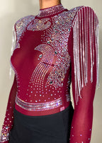 Party outfit
Nightclub fashion
Concert outfit
Festival look
Evening wear
Special occasion attire
Rhinestone-embellished bodysuit
Sheer long sleeve top
High-neck mesh bodysuit
Beaded shoulder details
Statement fringe design
Form-fitting mini skirt
Embellished sheer top
Bold and edgy look
High-fashion aesthetic
Daring and sexy outfit
Statement eveningwear
Eye-catching details
Trendy and bold ensemble