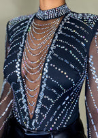 Nightclub outfit
Partywear bodysuit
Concert festival fashion
Special occasion top
Evening statement piece
Red carpet look
High-fashion event wear
Rhinestone-embellished bodysuit
Sheer mesh long sleeve top
High-neck crystal bodysuit
Deep V plunge bodysuit
Cut-out sheer design
Glamorous studded top
Sparkly beaded illusion bodysuit
Edgy and glamorous
Luxury high-fashion
Statement-making look
Bold and dazzling
Fashion-forward trend
Elegant yet daring
Sophisticated and sexy