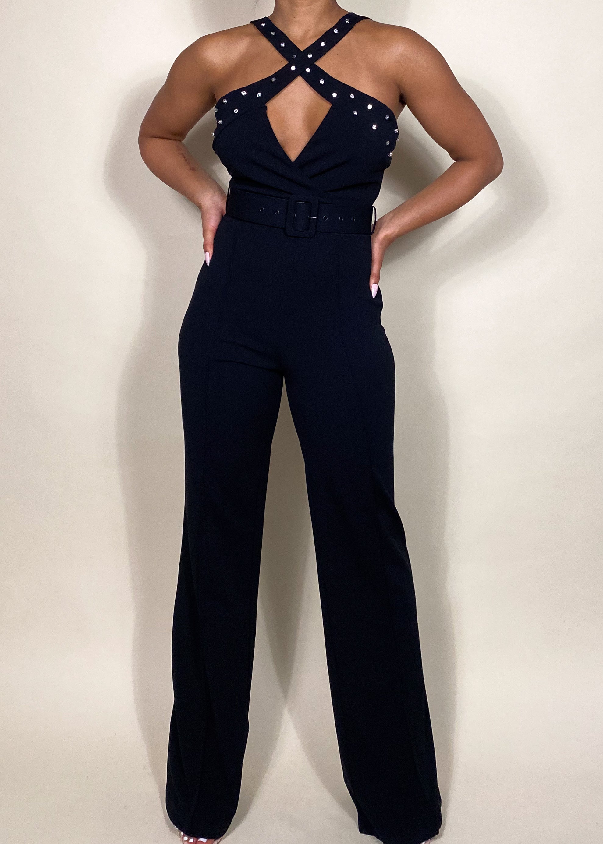 Elegant evening jumpsuit
Cocktail party outfit
Date night fashion
Formal event jumpsuit
Red carpet look
Wedding guest jumpsuit
Stylish partywear
Birthday celebration outfit
Chic clubwear outfit
Black tie event jumpsuit
Studded halter jumpsuit
Cross-neck jumpsuit
Belted waist jumpsuit
Wide-leg jumpsuit
Sleeveless evening jumpsuit
High-waisted jumpsuit
Tailored fit jumpsuit
Statement fashion piece
Luxury fashion jumpsuit
Glamorous black jumpsuit
Modern edgy fashion
Sophisticated yet bold
Sexy yet elegant outf