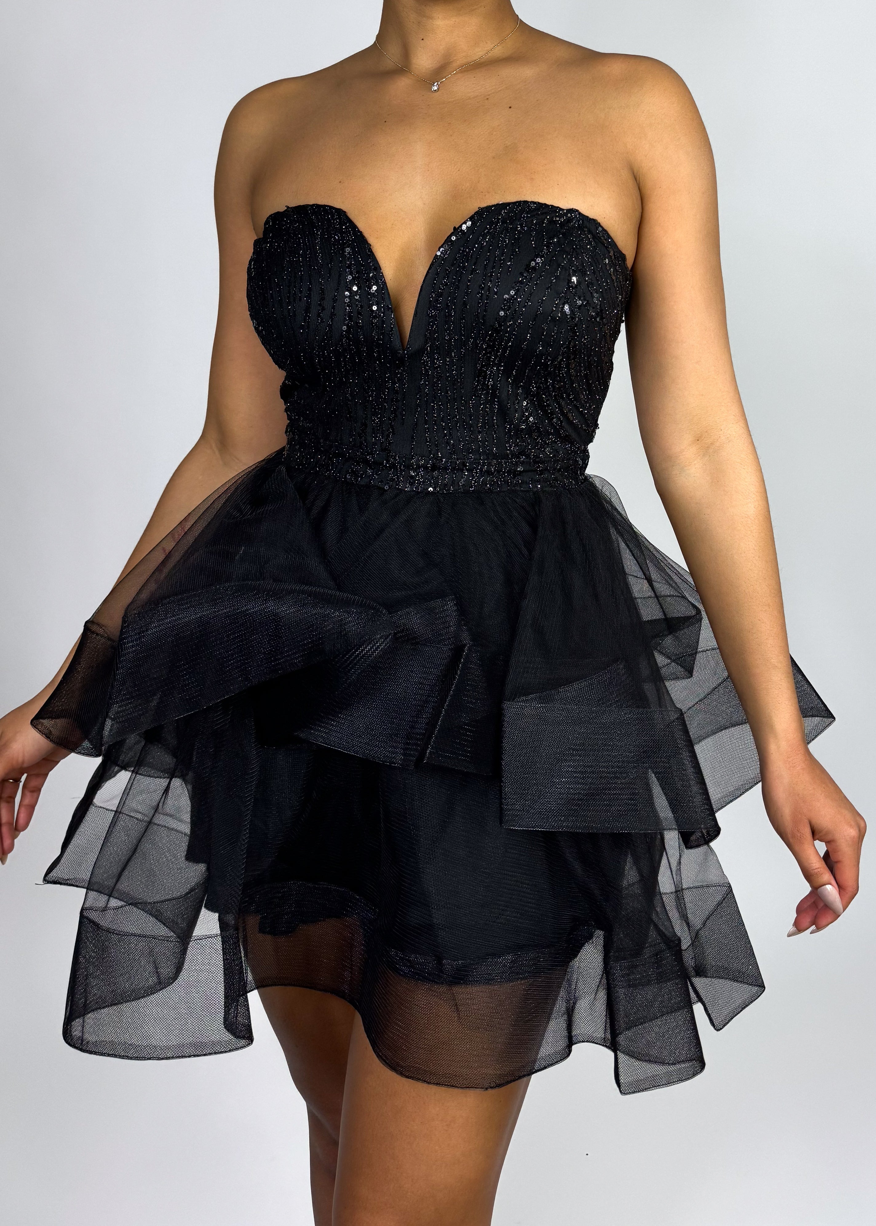 Homecoming dress
Prom party dress
New Year’s Eve outfit
Wedding guest cocktail dress
Bachelorette party dress Spring formal dress
Summer party outfit
Fall event dress
Winter holiday dress
Sweetheart neckline dress
Beaded bodice mini dress
Dramatic layered tulle dress
Short black formal dress
Flirty evening dress
Black tulle mini dress
Strapless party dress
Sequin corset dress
Layered ruffle cocktail dress
Elegant short evening dress