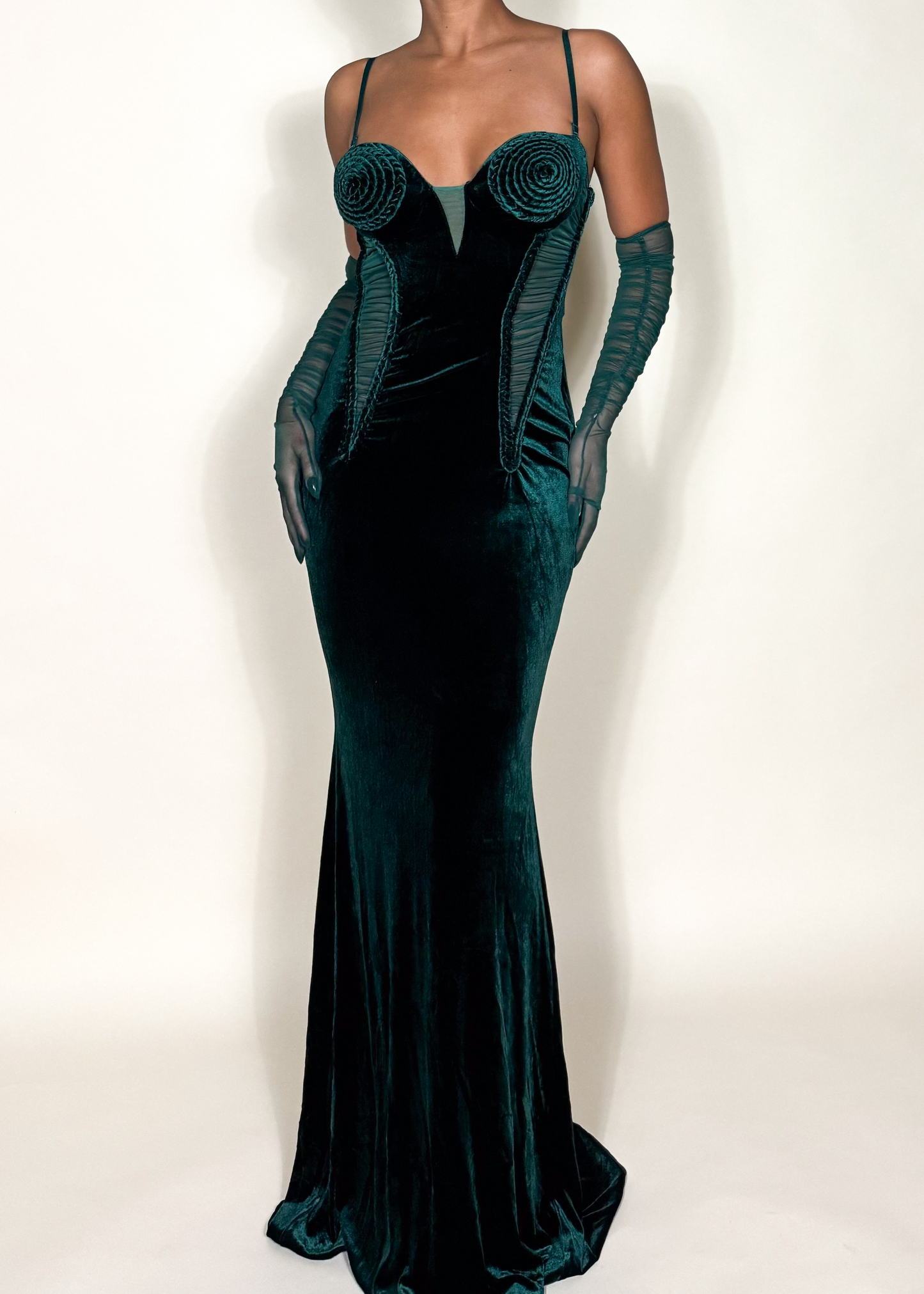 Red carpet evening gown
Gala night outfit
Luxury cocktail party dress
High-fashion editorial gown
Formal black-tie event dress New Year's Eve couture outfit
Structured corset dress
Spiral cup bustier gown
Sheer ruched gloves dress
Avant-garde evening wear
velvet dress
Emerald green velvet dress
Luxury corset gown
Vintage-inspired evening dress
Elegant sculptural dress