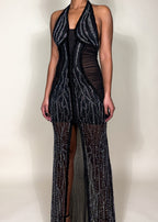 Luxury gala dress for women
 black-tie gown
 event dress
Nightclub outfit
prom dress 2025
Halter neck sheer mesh dress
Crystal-embellished black dress
Floor-length high-slit gown
Sexy yet elegant evening wear
Designer-inspired statement dress
Black rhinestone halter gown
Sheer illusion embellished dress
High-slit black evening dress
Elegant see-through beaded gown
Glamorous red carpet-inspired dress