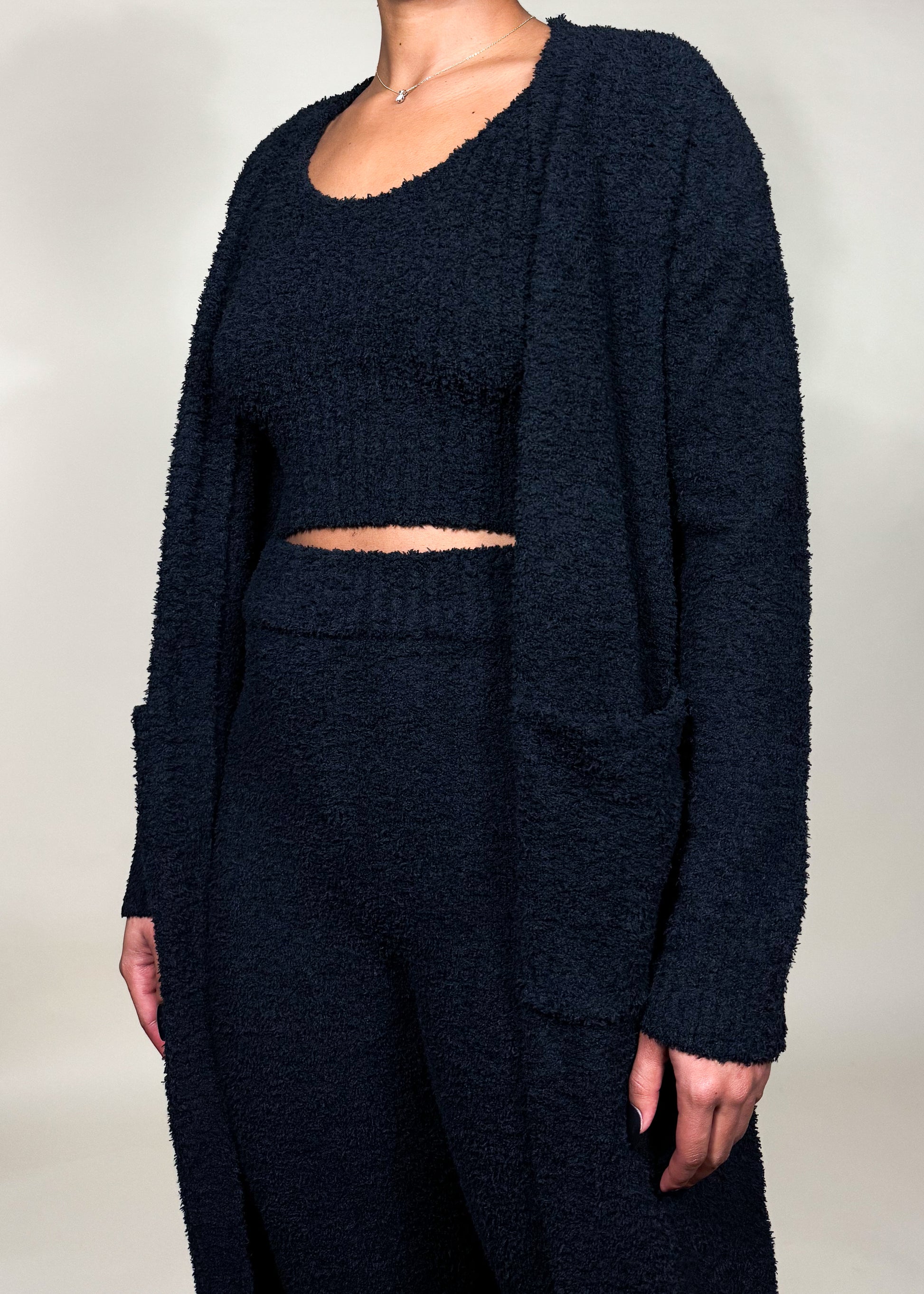 Loungewear, Casual wear, Cozy home outfit, Travel outfit, Work-from-home attire, Relaxed weekend style, Chilly weather layering, Three-piece knit set, Soft and fuzzy texture, Cropped tank top, High-waisted wide-leg pants, Long duster cardigan with pockets, Relaxed and cozy fit, soft fuzzy knitwear, Relaxed fit lounge pants, Minimalist winter outfit, Comfortable homewear set, Travel-friendly lounge set, Warm and stylish cardigan set, Chic casual knit outfit, Fashionable stay-at-home wear, Effortless comfy 
