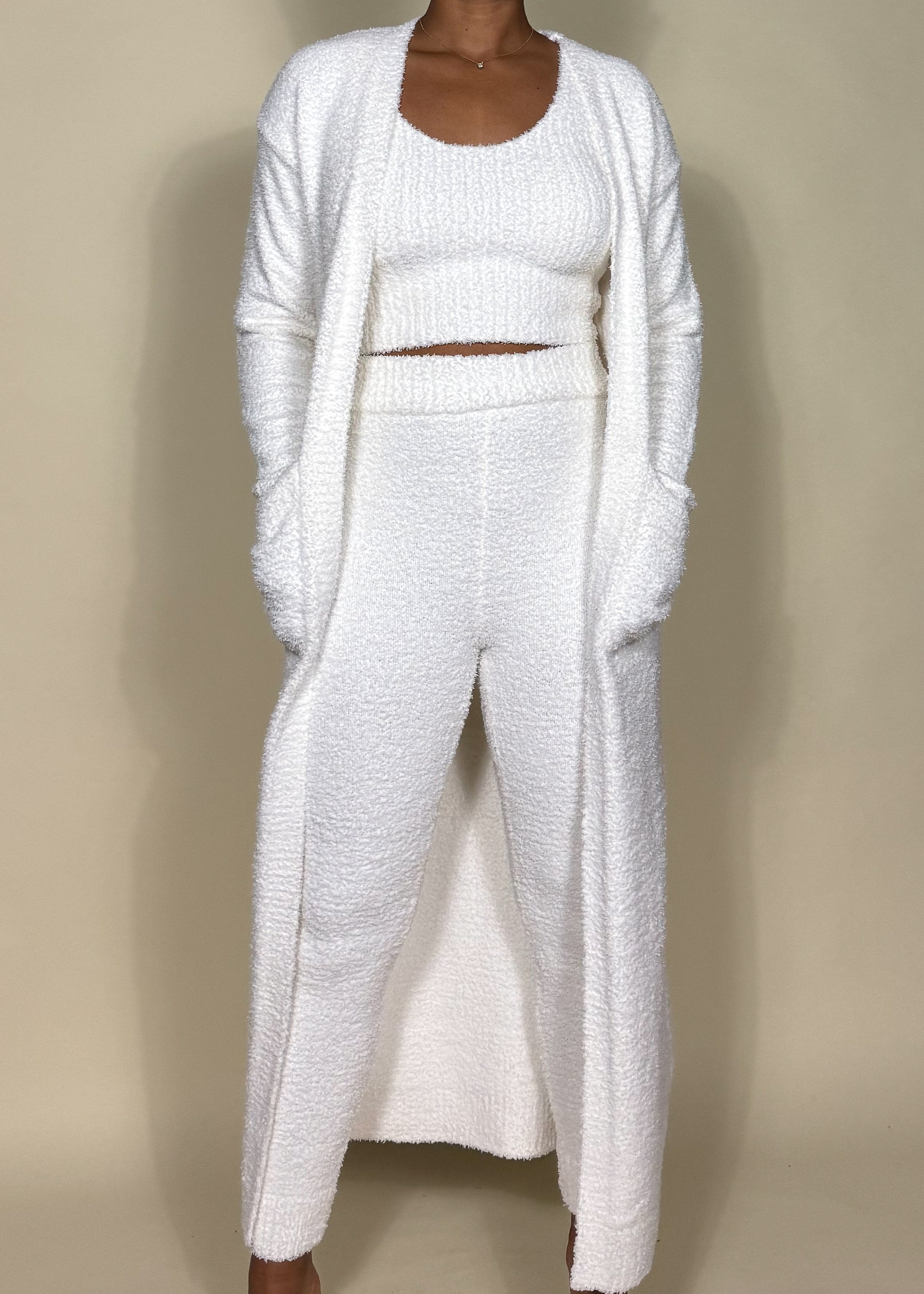 Loungewear, Casual wear, Cozy home outfit, Travel outfit, Work-from-home attire, Relaxed weekend style, Chilly weather layering, Three-piece knit set, Soft and fuzzy texture, Cropped tank top, High-waisted wide-leg pants, Long duster cardigan with pockets, Relaxed and cozy fit, soft fuzzy knitwear, Relaxed fit lounge pants, Minimalist winter outfit, Comfortable homewear set, Travel-friendly lounge set, Warm and stylish cardigan set, Chic casual knit outfit, Fashionable stay-at-home wear, Effortless comfy 
