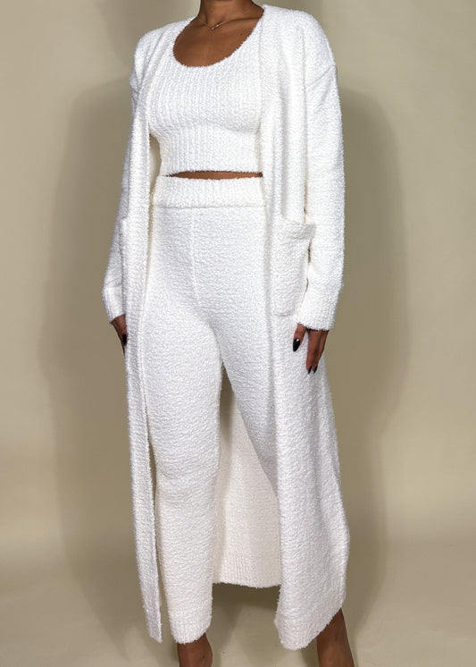 Loungewear, Casual wear, Cozy home outfit, Travel outfit, Work-from-home attire, Relaxed weekend style, Chilly weather layering, Three-piece knit set, Soft and fuzzy texture, Cropped tank top, High-waisted wide-leg pants, Long duster cardigan with pockets, Relaxed and cozy fit, soft fuzzy knitwear, Relaxed fit lounge pants, Minimalist winter outfit, Comfortable homewear set, Travel-friendly lounge set, Warm and stylish cardigan set, Chic casual knit outfit, Fashionable stay-at-home wear, Effortless comfy 
