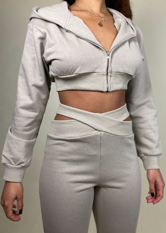 Casual loungewear
Athleisure outfit
Travel outfit
Weekend wear
Streetwear fashion
Cozy fall outfit
Everyday essentials
Cut-out waistband joggers
Cropped zip-up hoodie
High-waisted sweatpants
Two-piece lounge set
Elastic waist joggers
Hoodie with zipper
Soft fleece fabric
Sporty chic
Minimalist aesthetic
Relaxed fit
Trendy athleisure
Comfy yet stylish
Urban street style
Monochrome outfit