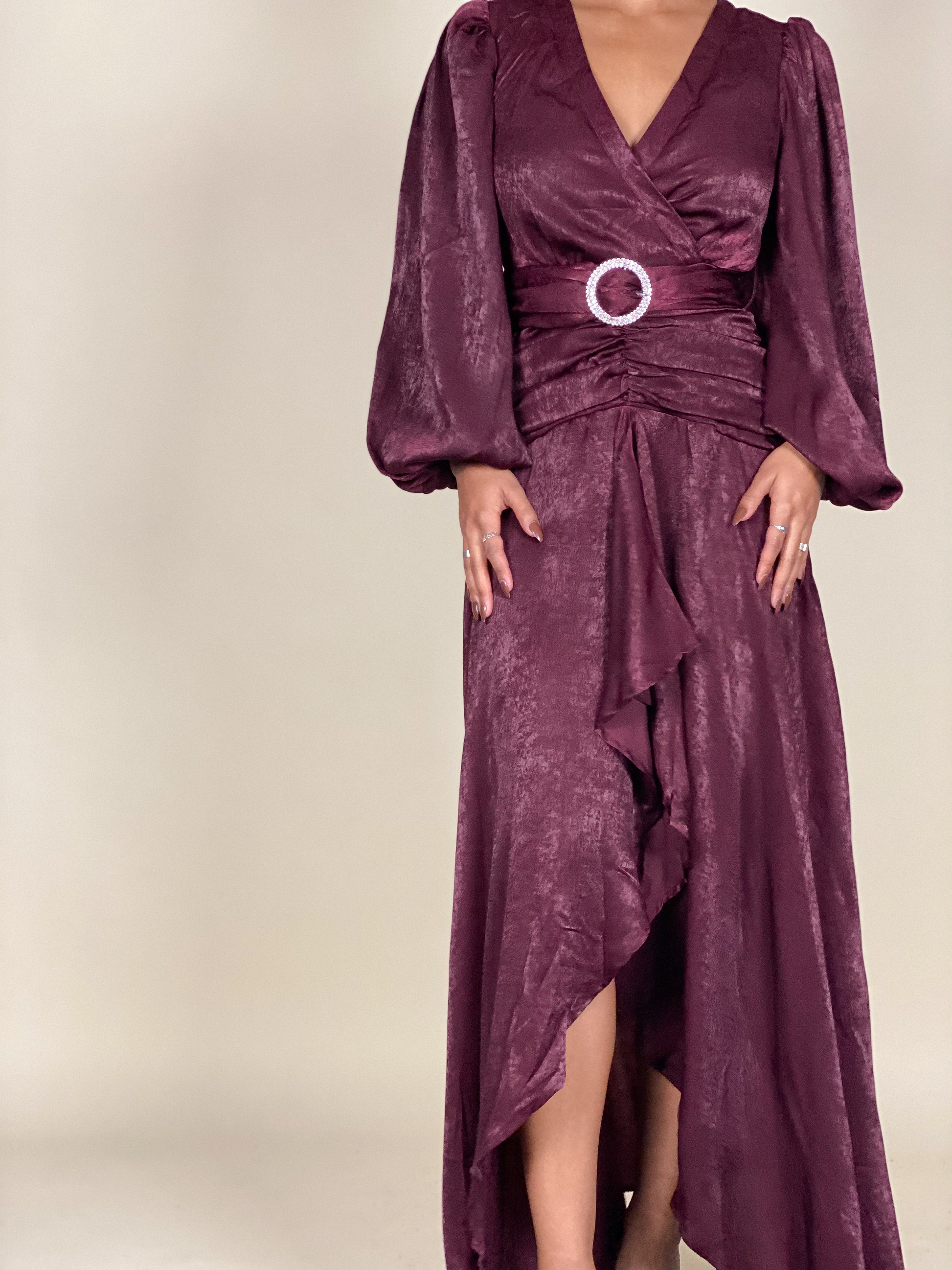 Sophisticated formal evening dress
Fall wedding guest maxi dress
Timeless gala wrap dress
Elegant holiday party outfit
Chic dinner date night gown
Draped V-neck satin dress
Statement sleeve formal gown
Soft shimmering wrap maxi dress
Flowing high-low ruffle dress
Belted waist luxury evening wear
Deep plum satin wrap dress
Long-sleeve belted evening gown
Luxe ruched maxi dress
Vintage-inspired high-slit dress
Elegant ruffle-hem satin dress