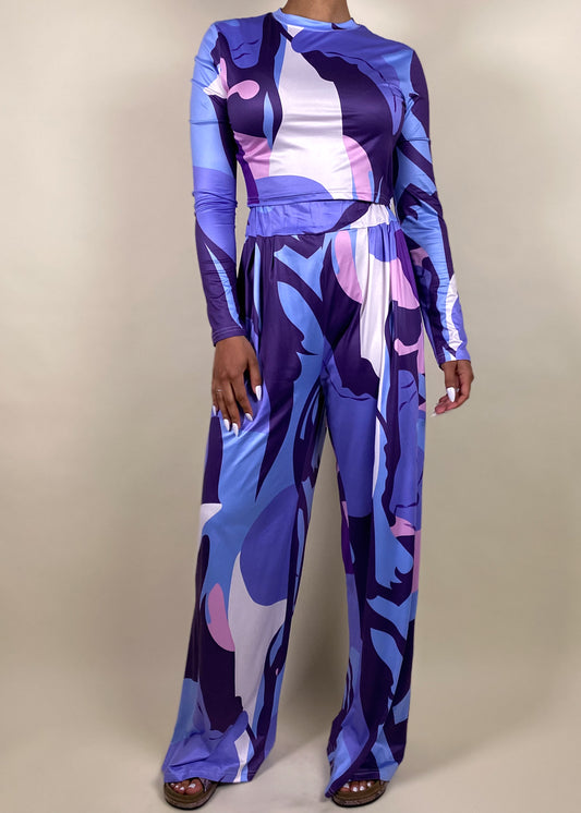 Trendy festival outfit
Standout vacation wear
Bold statement look for night out
Chic and comfy airport outfit
Stylish brunch or casual event outfit
Electric blue & purple print
Sleek high-waisted wide-leg pants
Fitted long-sleeve crop top
Ultra-soft & breathable fabric
Modern meets vintage aesthetic
Bold abstract print matching set
Retro-inspired printed co-ord
70s-style wide-leg pants & crop top
Vibrant long-sleeve crop top outfit
Street-style meets resort wear