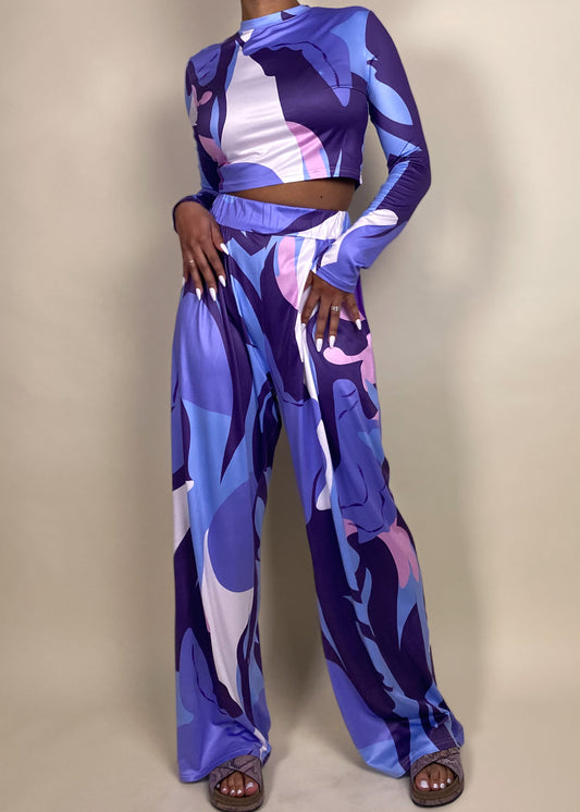 Trendy festival outfit
Standout vacation wear
Bold statement look for night out
Chic and comfy airport outfit
Stylish brunch or casual event outfit
Electric blue & purple print
Sleek high-waisted wide-leg pants
Fitted long-sleeve crop top
Ultra-soft & breathable fabric
Modern meets vintage aesthetic
Bold abstract print matching set
Retro-inspired printed co-ord
70s-style wide-leg pants & crop top
Vibrant long-sleeve crop top outfit
Street-style meets resort wear