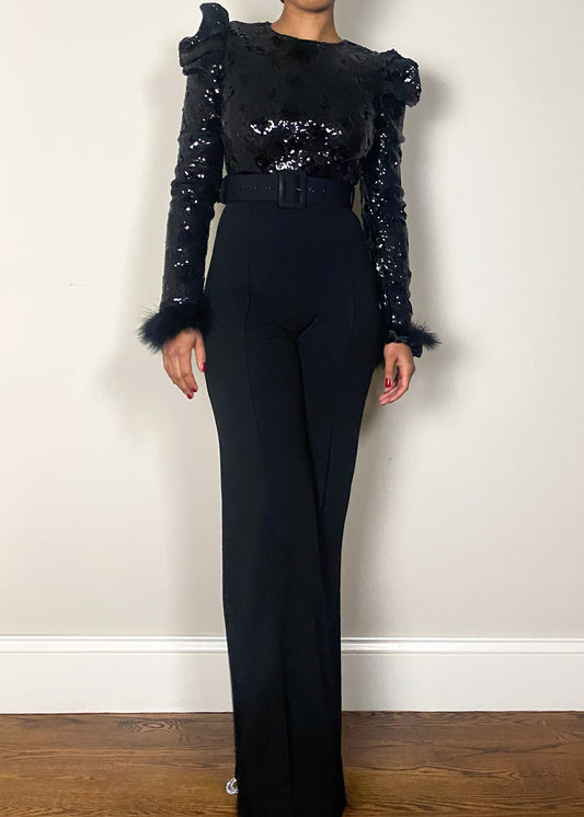 Elegant evening outfit
Formal party jumpsuit
Black tie fashion
Cocktail event attire
Glamorous holiday outfit
Statement nightwear
Red carpet-inspired fashion
High-fashion event look
Fashion-forward power dressing
Luxury gala outfit
Sequin embellished jumpsuit
Shoulder ruffle detailing
Fur cuff sleeve jumpsuit
High-waisted tailored jumpsuit
Elegant black jumpsuit
Wide-leg structured jumpsuit
Dramatic sleeve detailing
Power dressing one-piece
Modern tailored jumpsuit
High-glam sequin fashion
Chic 