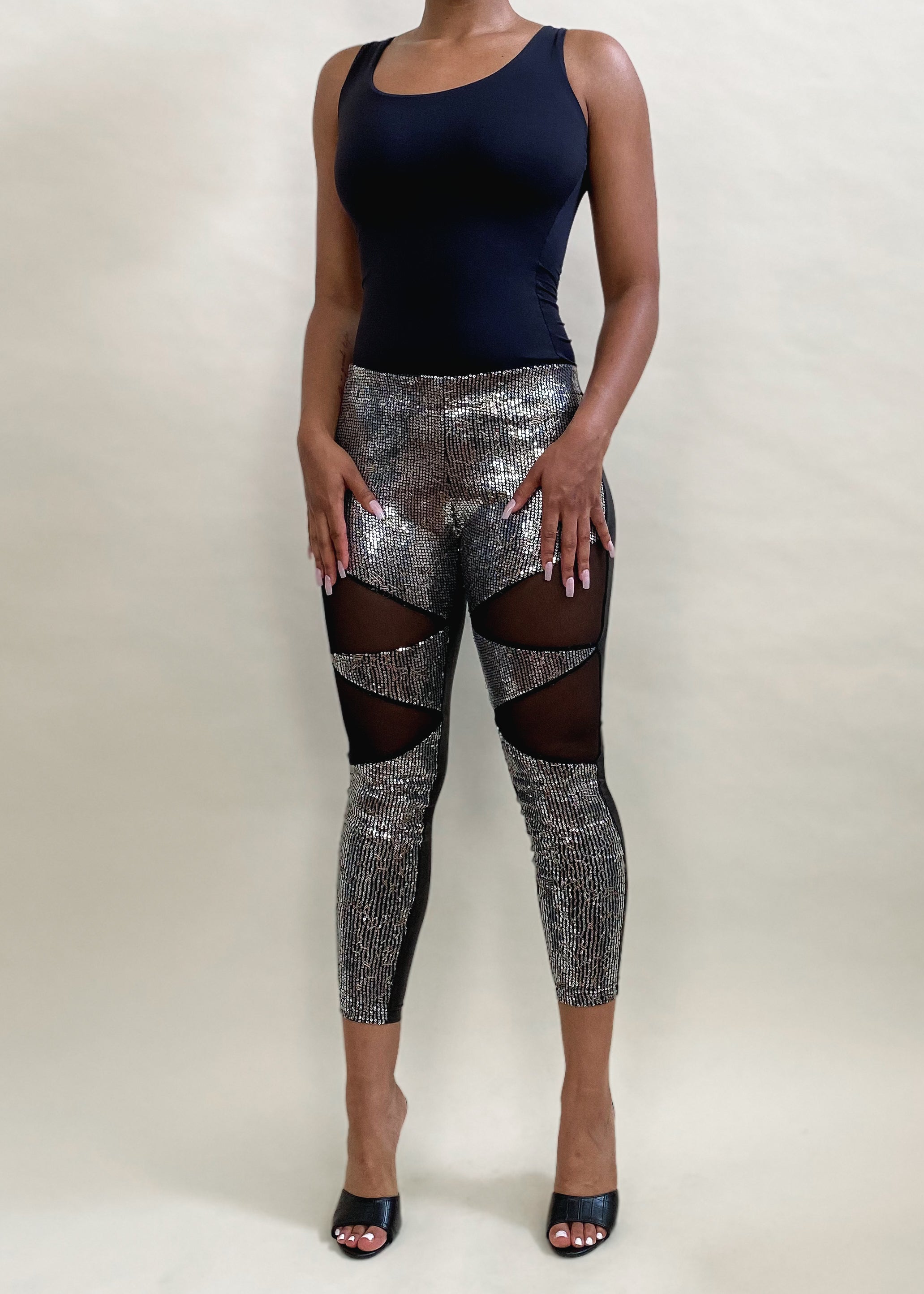 Partywear leggings
Nightclub outfit pants
Festival fashion
Concert outfit idea
Statement evening wear
Special occasion leggings
Rave fashion trends
Sequin mesh leggings
High-waisted sparkle pants
Cut-out leggings
Glitter glam pants
Metallic skinny leggings
Sheer panel pants
Trendy shimmer trousers
Edgy fashion statement
Sexy chic leggings
Bold partywear trend
Glam rock aesthetic
Fashion-forward club outfit
Stylish sequin pants
Modern streetwear glam